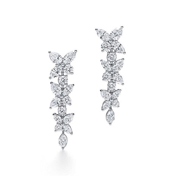 Aretes de Oro Blanco 18k con Moissanita - Fila de Diamantes