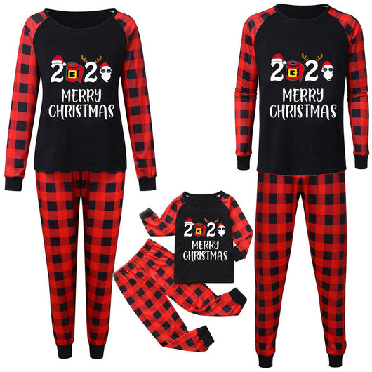 Three matching family Christmas pajama sets with black tops, red plaid sleeves, and red plaid pants. Tops feature '2020 MERRY CHRISTMAS' text. - Image 5