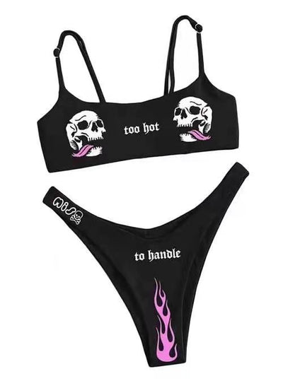 Black bikini swimsuit with white skull and pink flame prints. Top reads 'too hot', bottom reads 'to handle' with 'MISS' and a skull. - Image 2