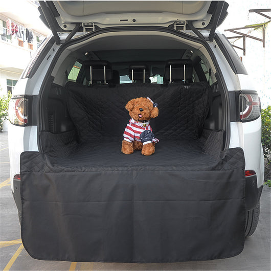 Gray quilted pet car mat installed in the trunk of a white SUV, protecting the cargo area and bumper. - Image 7