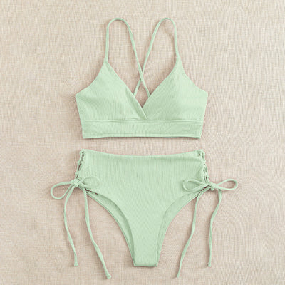 Light green ribbed bikini set with a V-neck bralette top and high-waisted bottoms featuring side tie details. - Image 7