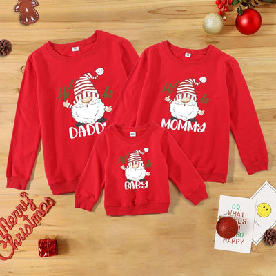 Family matching white long-sleeve crew neck tops with a cute snowman face print, featuring black eyes, an orange carrot nose, and a dotted smile. One adult top - Image 8