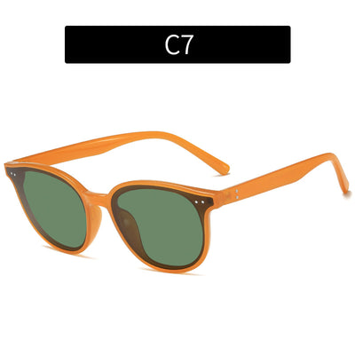 Jelly yellow frame sunglasses with green lenses, featuring a rounded cat-eye shape for UV protection and fashion. - Image 6