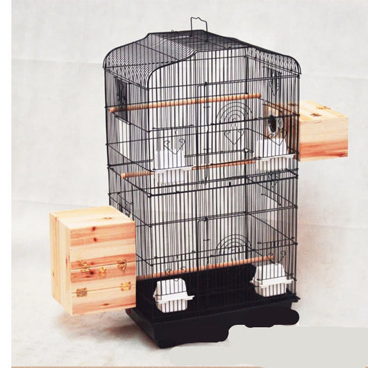 White wire bird cage with arched top, multiple wooden perches, plastic food cups, and two wooden nesting boxes. - Image 10
