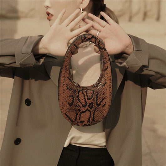 Bolso de Mano Tridimensional con Forma de Huevo - Image 5