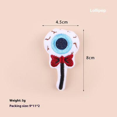 Plush cat teaser shaped like an eyeball lollipop with a blue iris, black pupil, and red bow. - Image 6