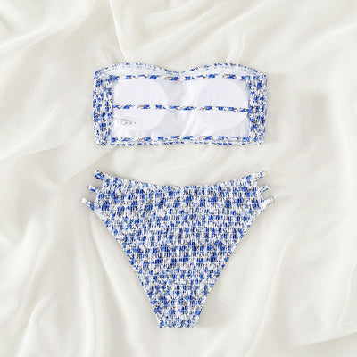 Floral smocked strapless bandeau bikini with high-cut bottoms featuring side straps, in white, teal, and red. - Image 3