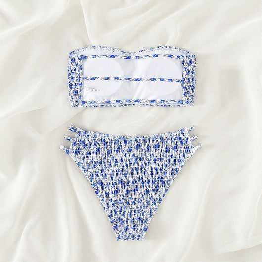 Floral smocked strapless bandeau bikini with high-cut bottoms featuring side straps, in white, teal, and red. - Image 3