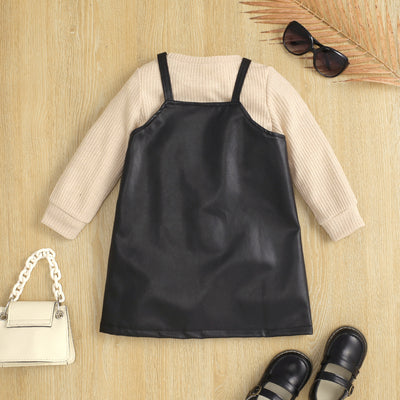 Conjunto Elegante: Blusa Tejida Manga Larga con Falda de Tirantes en Cuero
