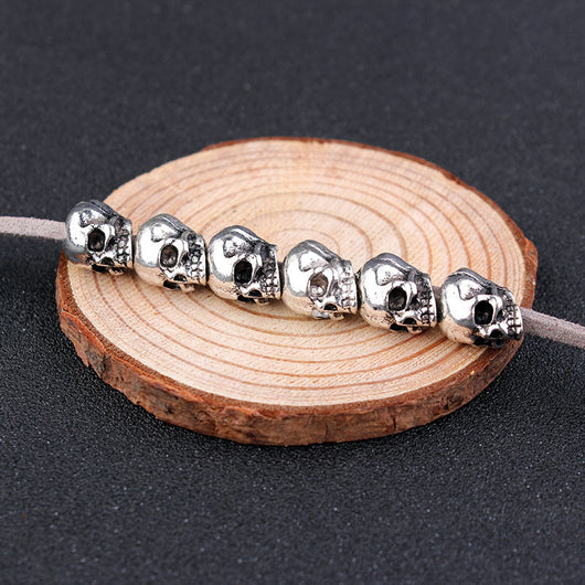 Red velvet rope with six silver-colored skull beads, ideal for DIY hair accessories or crafting projects. - Image 13