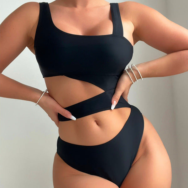 Black one-piece swimsuit with a square neckline, wide straps, and high-cut bottom, featuring a hollow-out midriff design.
