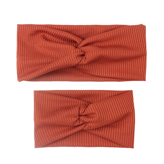 Matching dusty rose ribbed knit headbands with a twisted knot, one for an adult and one for a child. - Image 11