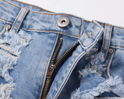 Jeans Vintage Desgastados con Roturas en las Rodillas - Image 4
