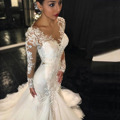 Vestido de Novia Elegante con Encaje Delicado y Silueta Estilizada - Image 4