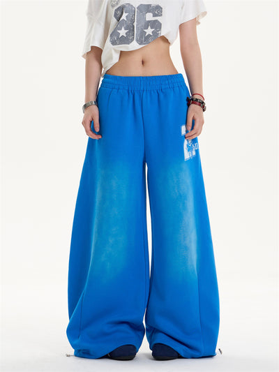 Pantalones Jogger Holgados con Letras Desgastadas y Cordón Ajustable - Image 16