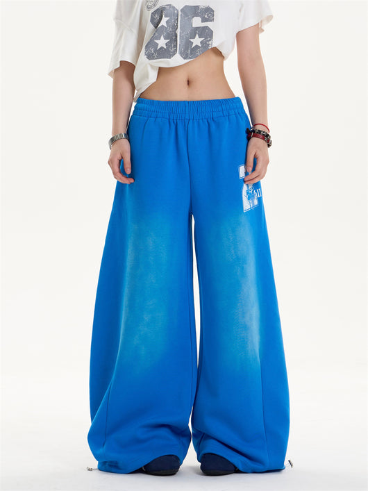 Pantalones Jogger Holgados con Letras Desgastadas y Cordón Ajustable - Image 16