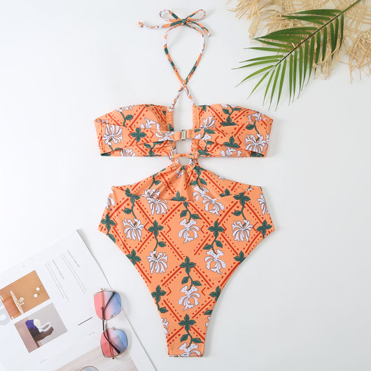 Dark green floral one-piece swimsuit with halter neck, bandeau top, cut-outs, and matching sheer sarong. - Image 13