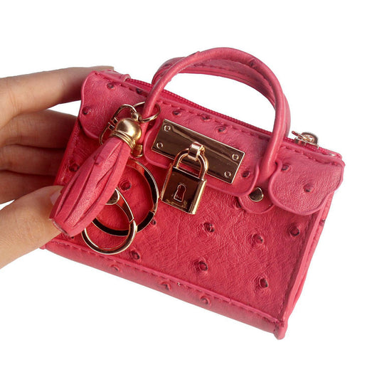 Bolso de Mano Minimalista en Cuero con Borlas - Image 5