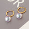 Aretes de Perla de Agua Dulce en Oro 18K AU750