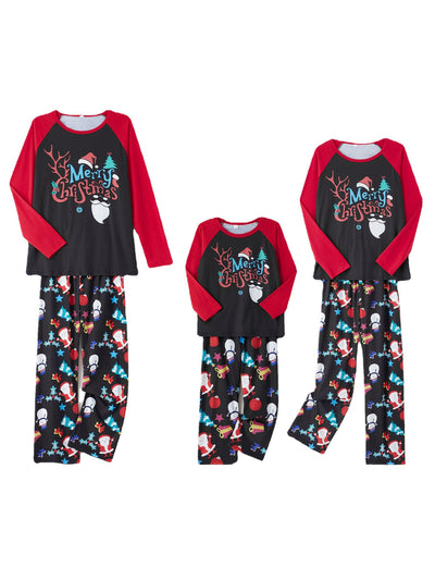 Man wearing a black and red long-sleeve Christmas pajama set with "Merry Christmas" graphic and Santa print pants. - Image 10