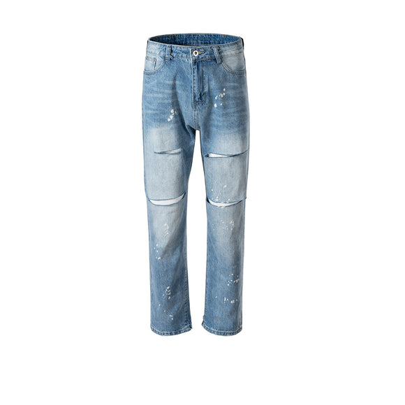 Jeans Rotos Unisex con Detalles de Pintura - Estilo Urbano Moderno