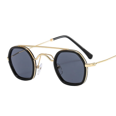 Green hexagonal frame sunglasses with blue to peach gradient lenses and gold-tone double bridge and temples. - Image 3