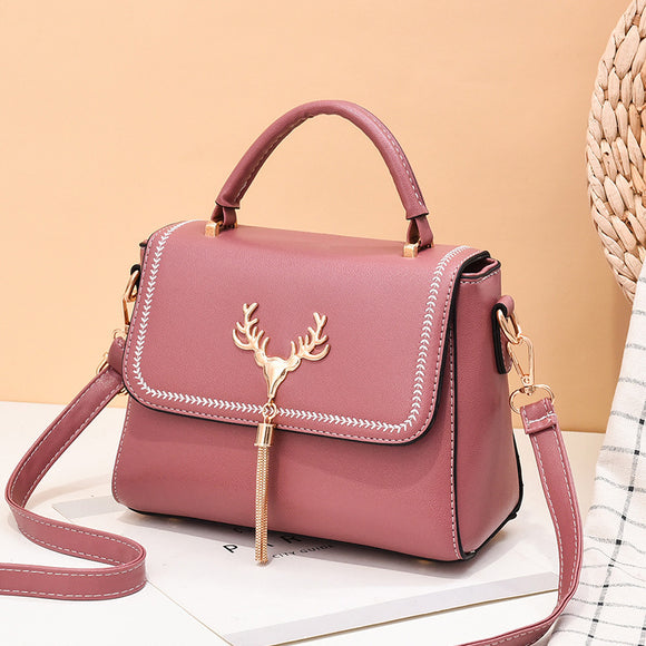 Bolso de Hombro con Cabeza de Venado y Borlas - Diseño Moderno para Mujer