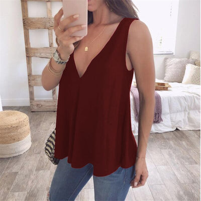 Blusa Suelta Escote en V Profundo sin Mangas Color Sólido - Image 9