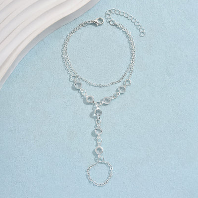 Gold-tone layered bracelet ring with clear crystal accents and a finger loop, featuring a lobster clasp closure. - Image 7