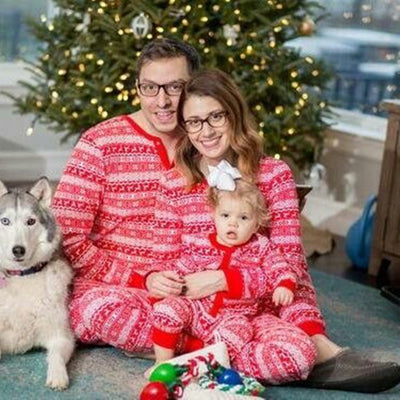 Red and white Christmas loungewear pajama set with reindeer and snowflake fair isle pattern.