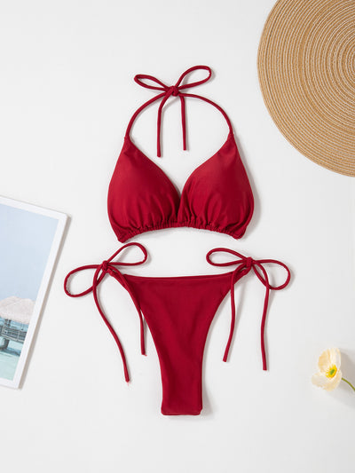 Red solid color two-piece bikini swimsuit with a halter tie-top and adjustable tie-side thong bottom. - Image 6