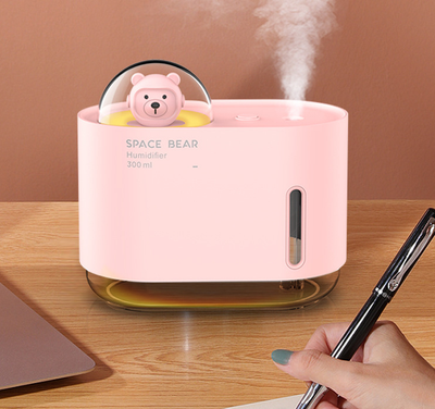 White square humidifier with a clear base, featuring a cute white bear figure in a clear dome, labeled "SPACE BEAR Humidifier 300 ml". - Image 12