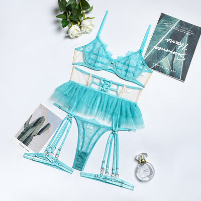 Mint green mesh and lace lingerie set with underwire bra, ruffled garter belt, and thong, displayed flat. - Image 3