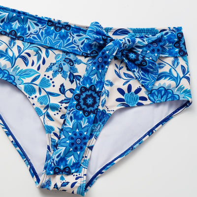 Women's blue and white floral two-piece swimsuit with ruffled cap sleeves and high-waisted bottom. - Image 14