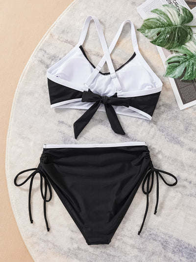 Black and white color matching bikini swimsuit with a high-waisted drawstring bottom and a split top. - Image 15