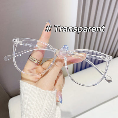 Black full-frame round anti-blue light glasses held by a hand with a gold ring and light blue gradient nails. - Image 8