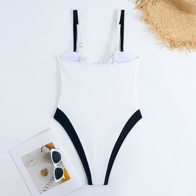 White one-piece women's swimsuit with black side panels and straps, featuring a ruched bust and U-shaped detail. - Image 7