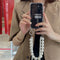 Funda para iPhone XS/XR con Cadena de Perlas Grandes - Protección Elegante