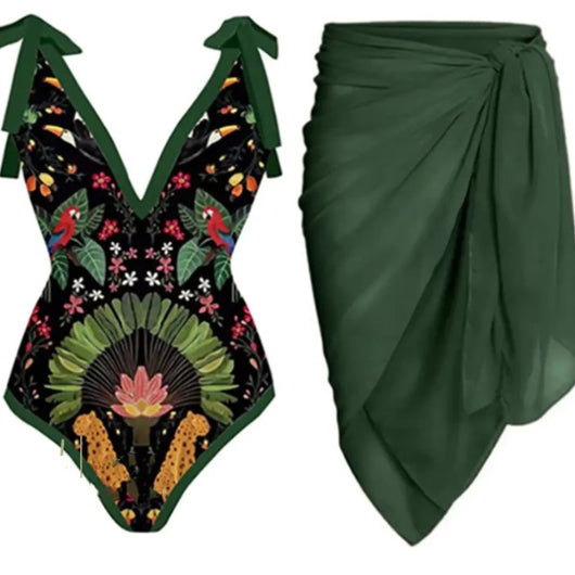 Women's black one-piece swimsuit with a deep V-neck and shoulder ties, featuring a vibrant tropical print of parrots, toucans, leopards, and flowers.