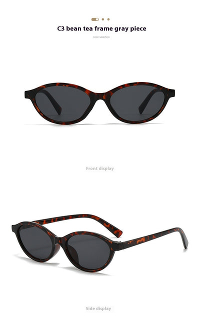 Retro fashion small frame sunglasses with translucent brown frames and yellow oval lenses, viewed from an angle. - Image 23