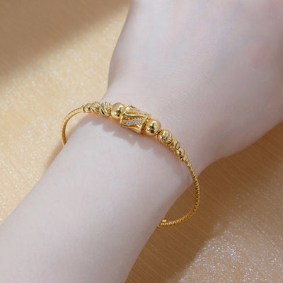Pulsera Dorada de Esferas Africanas Árabe para Mujer - Image 6