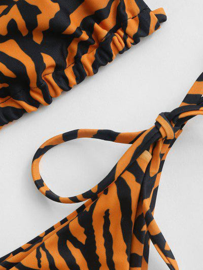 Women's high-waisted bikini with brown and white zebra print, featuring a triangle top and side-tie bottoms. - Image 13