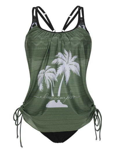 Olive green tankini top with white palm trees and 'live simple' text, paired with black swim bottoms on a beach. - Image 16