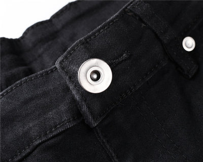 Jeans Slim Fit Azul con Corte en Rodilla y Diseño Spray Pintado - Image 20