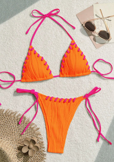 Light blue ribbed bikini swimsuit with pink tie straps and lacing detail, featuring a triangle top and thong bottom. - Image 11