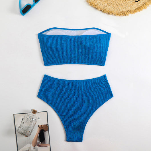 Blue high-waisted bikini set with a textured bandeau top and high-cut bottoms, laid flat on white. - Image 30