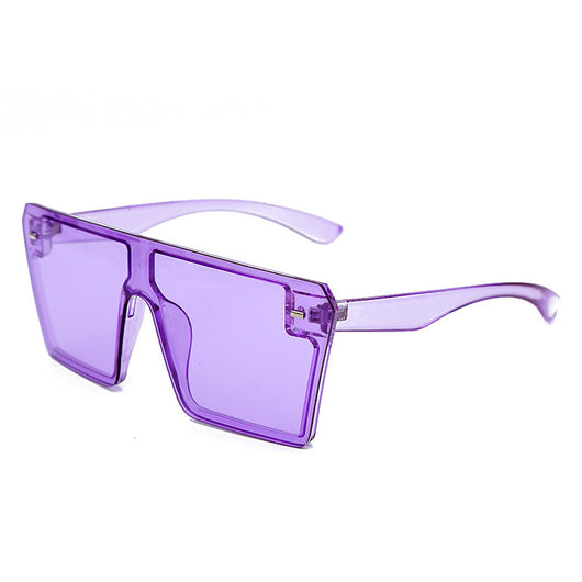 Oversized flat-top sunglasses with translucent red plastic frames and matching red lenses on a white background. - Image 13