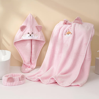 Pink coral fleece bath towel set with cartoon animal faces, including a hooded dry hair cap, a bath skirt, and a headband.