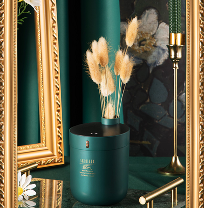 Dark green cylindrical humidifier with a black top, 300mL capacity, and a single control button. - Image 14