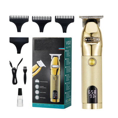 Gold metal hair clipper with LCD digital display, guide combs, USB cable, cleaning brush, and oil, in packaging.